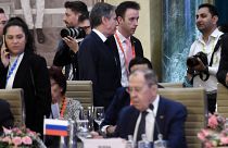 US Secretary of State Antony Blinken (top C) walks past Russian Foreign Minister Sergei Lavrov (lower) during the G20 foreign ministers' meeting in New Delhi on March 2, 2023.