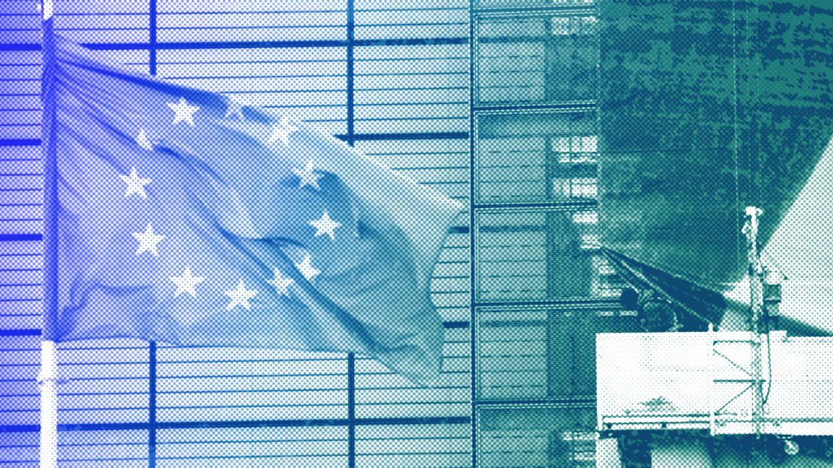 A new banner about the EU economic recovery package is being unveiled on the front of the Berlaymont building, May 2021
