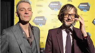 Pulp bass player Steve Mackey (left) with Pulp's Jarvis Cocker - Mackey has died at the age of 56