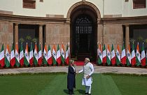 Italian Premier Giorgia Meloni, left, and Indian Prime Minister Narendra Modi, pose for the media before their meeting in New Delhi, India, Thursday, March 2, 2023.