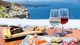 A table with Greek food and wine 