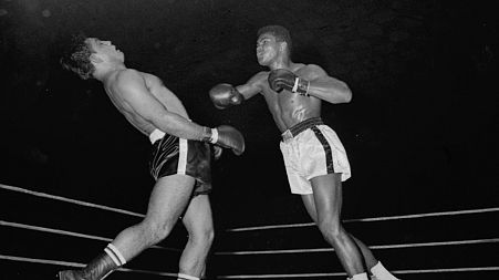 Alex Mitoff reels under the Cassius Clay attack in the sixth round in which Clay clobbered the Argentinean to the canvas.