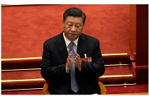 الرئيس الصيني شي جين بينغ، خلال الجلسة الافتتاحية للاجتماع السنوي للمجلس الوطني لنواب الشعب الصيني في قاعة الشعب الكبرى في بكين، في 5 مارس 2022