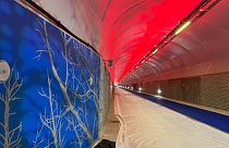 Artwork and installations line the tunnel in Bergen.