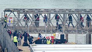 People believe to be migrants, onboard a Border Force vessel following a small boat incident in the Channel, England, Monday March 6, 2023.