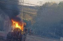 معدات بناء تحترق في الموقع المخطط لبناء مركز لتدريب الشرطة بمدينة أتلانتا الأمريكية