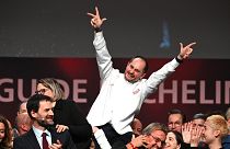 Alexandre Couillon celebrates after being awarded a third Michelin star, during the 2023 edition of the Michelin guide awards ceremony on March 6, 2023 in Strasbourg