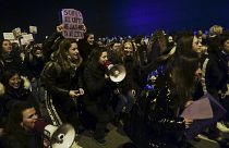 People gather during a demonstration on International Women's Day, in Pamplona, northern Spain, on 8 March, 2022