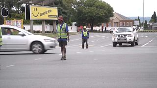 South Africa: As lights go off, homeless 'wardens' offer respite to Johannesburg motorists