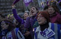 Protesters attend an International Women's Day demonstration in Madrid.