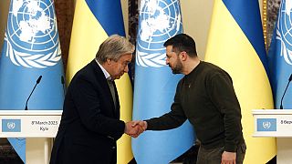 Ukrainian President Volodymyr Zelenskyy shakes hands with United Nations Secretary-General Antonio Guterres in Kyiv, Ukraine, March 8, 2023.