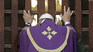 FILE — Pope Francis opens the holy door of the Bangui cathedral, Central African Republic, to open his yearlong Jubilee of Mercy, on Nov. 29, 2015.