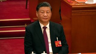 Chinese President Xi Jinping attends a session of China's National People's Congress at the Great Hall of the People in Beijing.