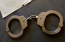A pair of handcuffs.