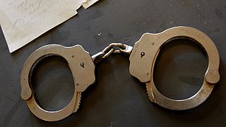 A pair of handcuffs.