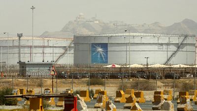 Storage tanks are seen at the North Jiddah bulk plant, an Aramco oil facility, in Jiddah, Saudi Arabia, on March 21, 2021