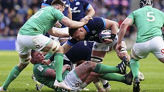 Scotland's Matt Fagerson, centre, is tackled, during the Six Nations rugby union international match between Scotland and Ireland at BT Murrayfield Stadium, in Edinburgh.