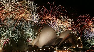 Fireworks light up the night sky above the Sydney Opera House for the APEC summit in Sydney, Australia, Saturday, Sept. 8, 2007. 