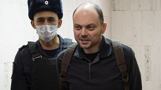 Russian opposition activist Vladimir Kara-Murza is escorted to a hearing in a court in Moscow, Russia, Feb. 8, 2023