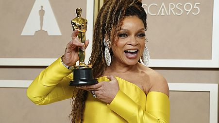 Ruth E. Carter holds up her Oscar for Best costume design for 'Black Panther: Wakanda Forever' on Sunday, March 12, 2023, at the Dolby Theatre