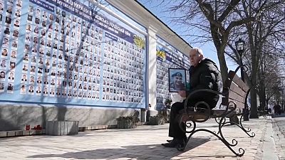 حفل تأبيني في كييف للمتطوعين الأوكرانيين الذين قتلوا في الدفاع عن وطنهم، 14 مارس 2023.