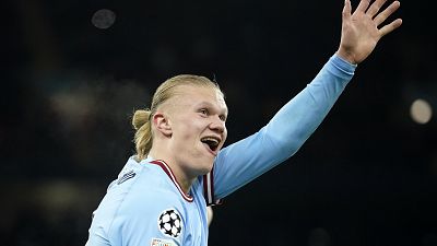 Manchester City's Erling Haaland shows five with his hand after he scored his 5th goal during the Champions League last 16 second leg between Manchester City and RB Leipzig