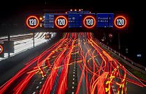 A long exposure photo shows traffic moving along a highway in Frankfurt, Germany, Oct. 6, 2022.