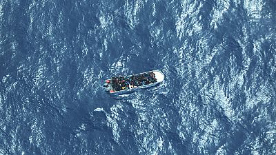Illustration photo: a boat carrying a group of stranded migrants in the southern Mediterranean Sea