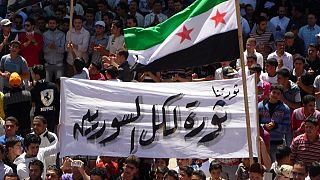 صورة من عام 2012 أثناء مظاهرة مناوئة لنظام السوري في إدلب