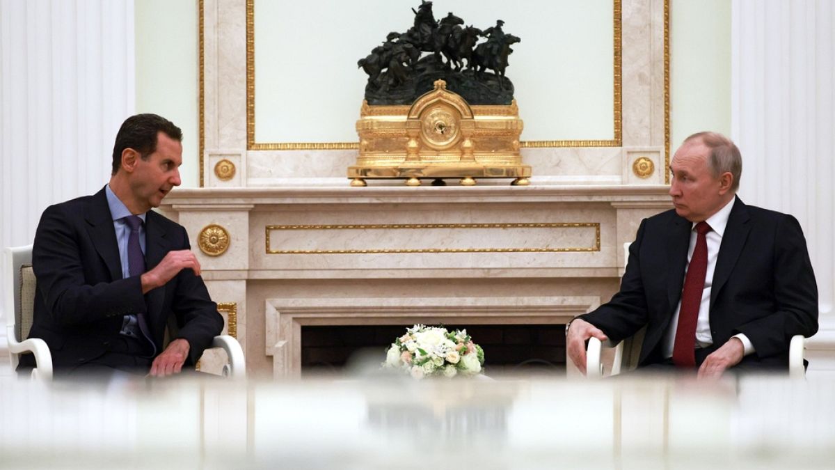 بشار الأسد وفلاديمير بوتين خلال الاجتماع
