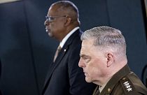 ecretary of Defense Lloyd Austin, left, accompanied by Chairman of the Joint Chiefs, Gen. Mark Milley, right in Washington, Wednesday, March 15, 2023. 