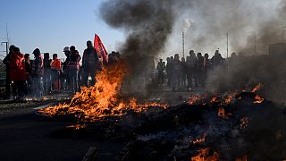 Burning detritus after pension reform protests in Paris