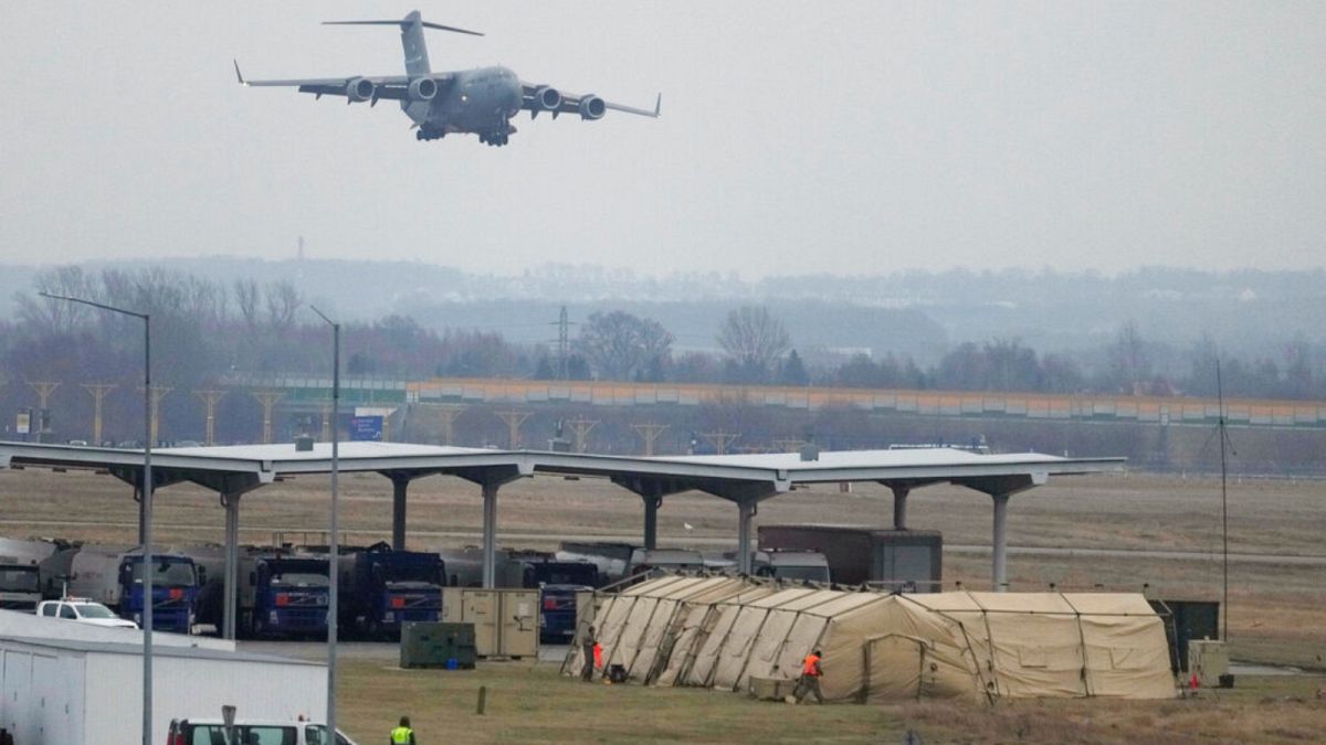 A U.S. Air Force plane landing at the Rzeszow-Jasionka airport in southeastern Poland on Sunday, Feb. 6, 2022