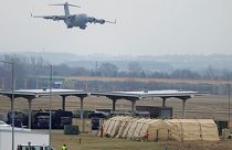 A U.S. Air Force plane landing at the Rzeszow-Jasionka airport in southeastern Poland on Sunday, Feb. 6, 2022