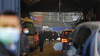 WHO team enters the interior of the Huanan Seafood Market on the third day of field visit in Wuhan in central China., Jan. 31, 2021