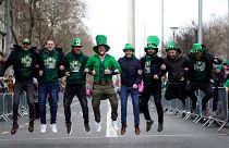 People arrive for the St Patrick's Day Parade in Dublin, Friday March 17, 2023