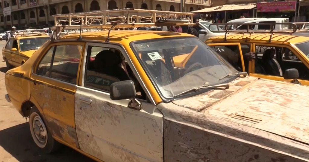 Traditional yellow taxis of Khartoum struggling to survive