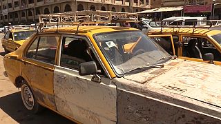 Traditional yellow taxis of Khartoum struggling to survive