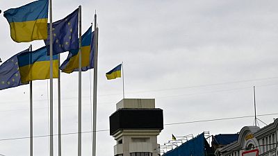 Flags of Ukraine and European Union wave at European Square in Kyiv on June 24, 2022.
