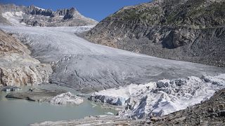 Parts of the Rhone Glacier are covered in blankets above Gletsch near the Furkapass in Switzerland, 13 July 2022.