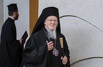 Ecumenical Patriarch of Constantinople Bartholomew I walks during his meeting with Lithuanian Prime Minister Ingrida Simonyte