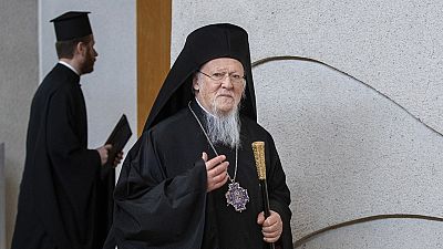 Ecumenical Patriarch of Constantinople Bartholomew I walks during his meeting with Lithuanian Prime Minister Ingrida Simonyte