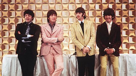  The Beatles, (L to R) Paul McCartney, John Lennon, Ringo Starr and George Harrison, holding a press conference in Tokyo at the start of their tour, 1966.