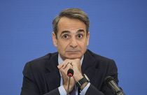 Greek Prime Minister Kyriakos Mitsotakis listens a question during a news conference, in Athens, Monday, Jan. 23, 2023