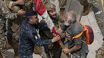 A retired army soldier arguing with Lebanese army and riot policeman, in Beirut, Lebanon, Wednesday, March 22, 2023