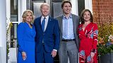 President Joe Biden and first lady Jill Biden pose for members of the media as they arrive to visit with Canadian Prime Minister Justin Trudeau and his wife Sophie Gregoire 