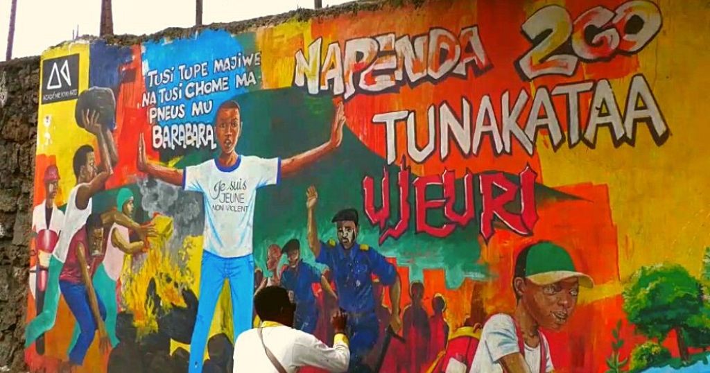 Streets artists in Goma use walls to appeal for peace