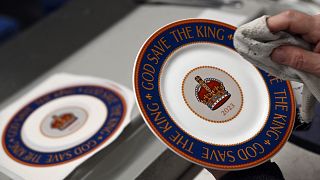 A china plate with 'God save the King' imprinted on it.