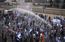 Israeli police using water cannon on protesters in Tel Aviv opposing the government’s judicial overhaul.