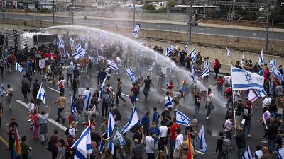 Israeli police using water cannon on protesters in Tel Aviv opposing the government’s judicial overhaul.
